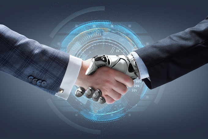 human hand shaking robot hand depicting A.I intelligence