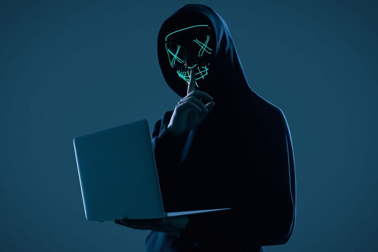 cyber criminal committing digital fraud